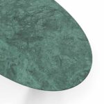 Oval Emerald Dining Table by Nolita Harbour with a luxurious Guatemala marble top and walnut legs accented with straw.