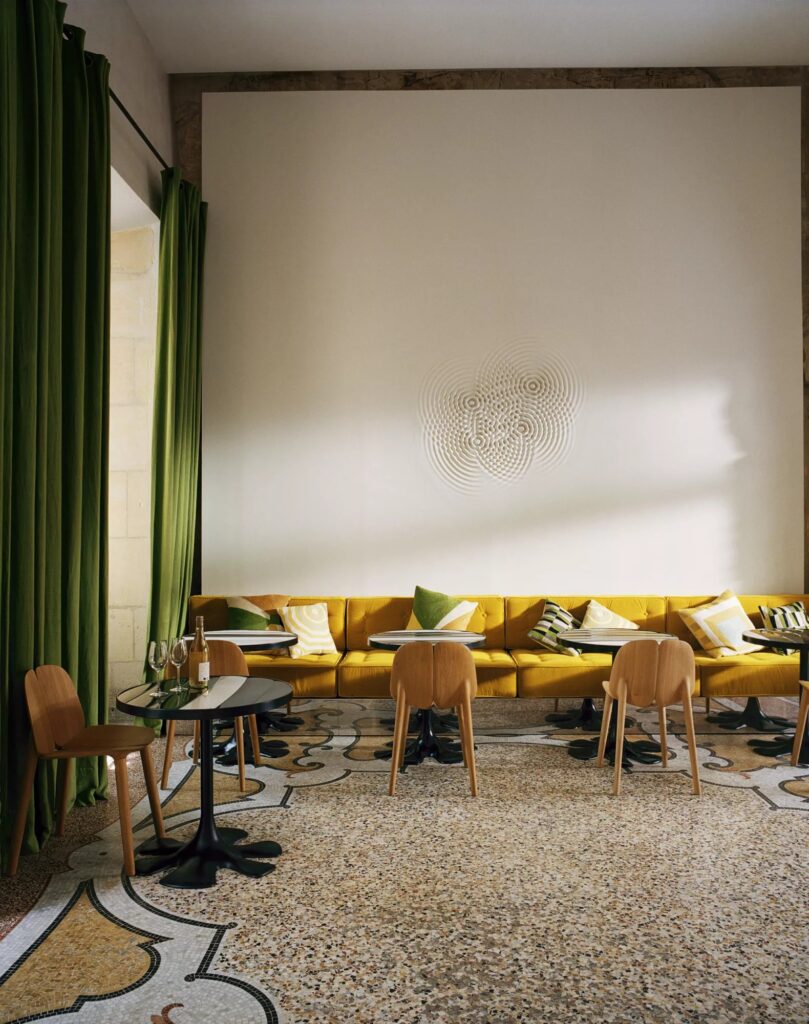 Hôtel du Cloître interior by India Mahdavi, with bold colors and historic charm - Nolita Harbour