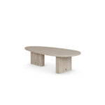 Oval travertine coffee table with two vertical slab legs and subtle brass accents, Landi by Nolita Harbour.