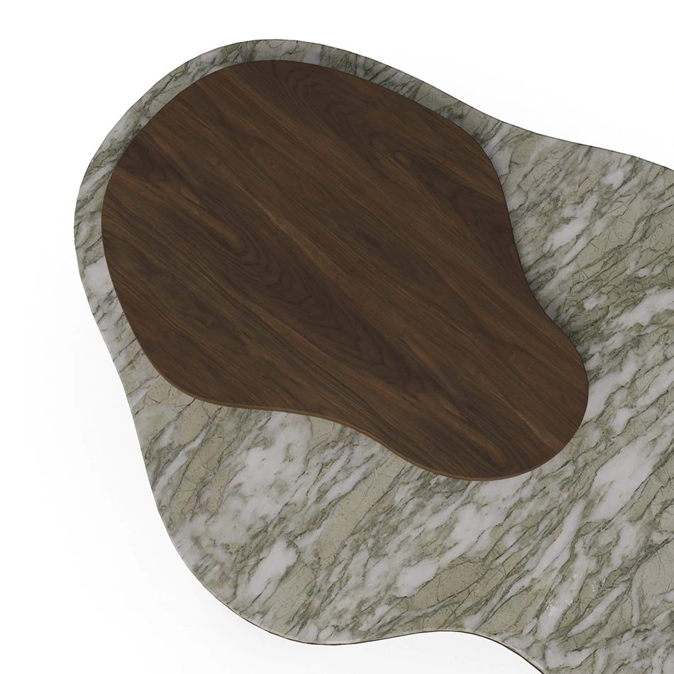 The Deolin Coffee Table redefines organic luxury through its sculptural form and rich natural materials. Featuring a fluid, biomorphic silhouette, the tabletop is crafted in striking Persian Green marble, punctuated by a walnut wood inlay that adds warmth and contrast. Its curved, asymmetrical shape rests on four solid walnut cylindrical legs, creating a bold presence while preserving a soft, contemporary elegance. Perfect for sophisticated interiors, the Deolin table brings visual intrigue to any living room with its harmonious blend of materials and textures. Whether styled in minimalist, modern, or eclectic settings, it serves as a captivating centerpiece that balances artistic design with everyday function. detail view