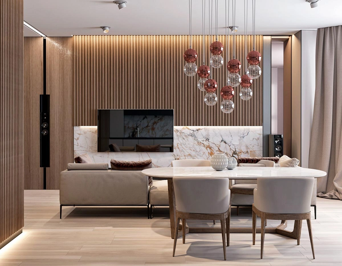 Contemporary open-plan interior combining marble surfaces, walnut wall panels, and designer lighting, reflecting modern luxury materials in residential design.