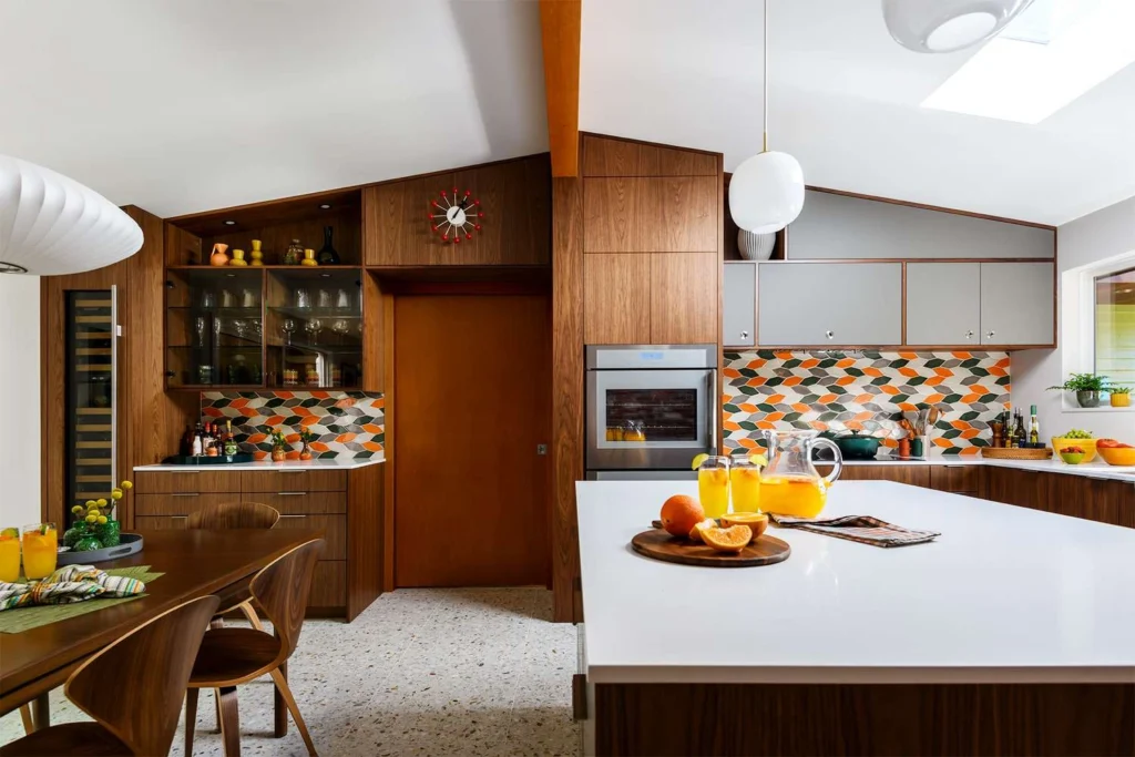 Mid-century modern kitchen blending functional design, warm wood cabinetry, and contemporary luxury detailing