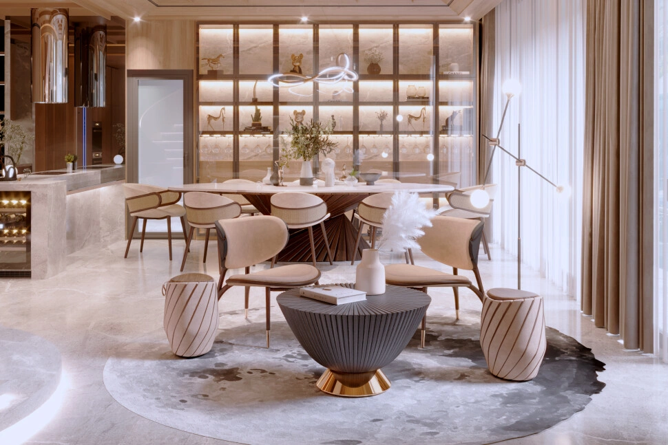 Elegant contemporary dining and living area showcasing designer furniture, curved dining chairs, sculptural tables, and soft ambient lighting in a refined luxury interior.