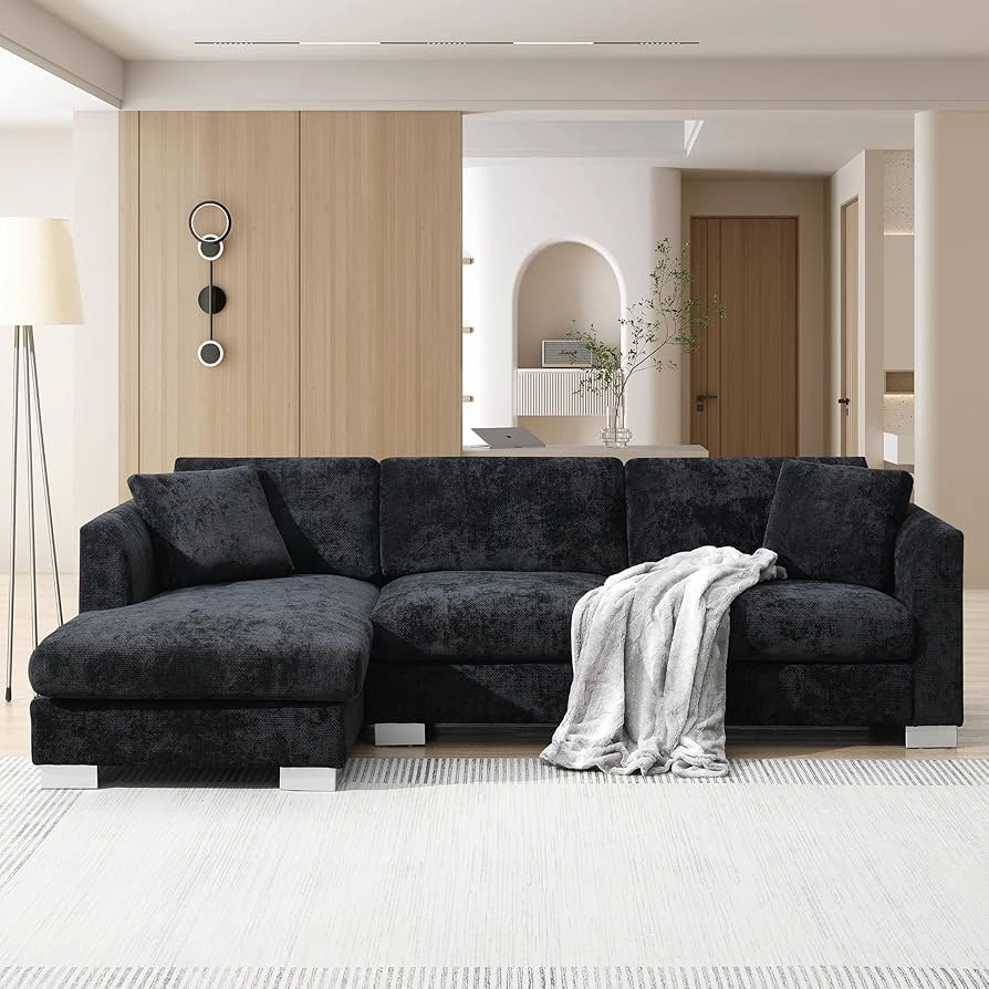 Luxury living room interiors featuring modular sectional sofas with corner modules and chaise lounge units, styled with statement ottomans, layered textiles, and contemporary décor in refined, light-filled residential settings.