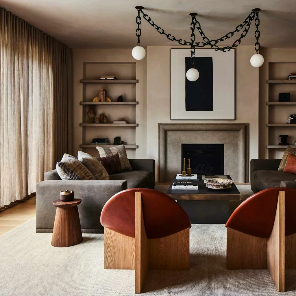 Sophisticated living room featuring architectural furniture, warm wood tones, textured textiles, and balanced proportions exemplifying luxury interior design rules and visual hierarchy.