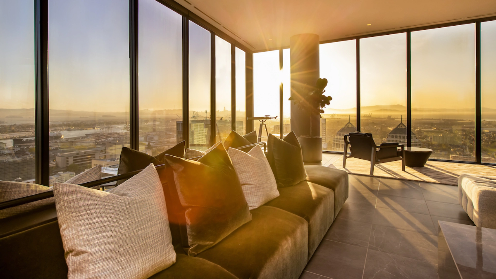 Contemporary luxury interior showcasing modern homes with open-plan living, floor-to-ceiling windows, bespoke kitchen with marble island, spa-inspired bathroom, curated entryway, private library, seamless indoor-outdoor terrace, and layered ambient lighting defining an elevated luxury lifestyle.